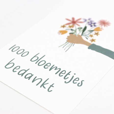 Sfeerfoto kaartje 75 x 110 mm met de tekst ‘1000 bloemetjes bedankt’