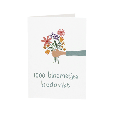 Voorkant foto kaartje 75 x 109 met de tekst ‘1000 bloemetjes bedankt’